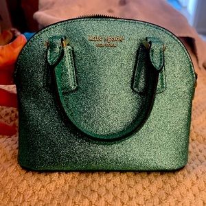 Kate spade mini. never used. Looking for a quick sale. Make me an offer :-)